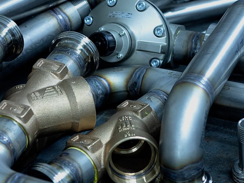 a bunch of different types of pipes on a table